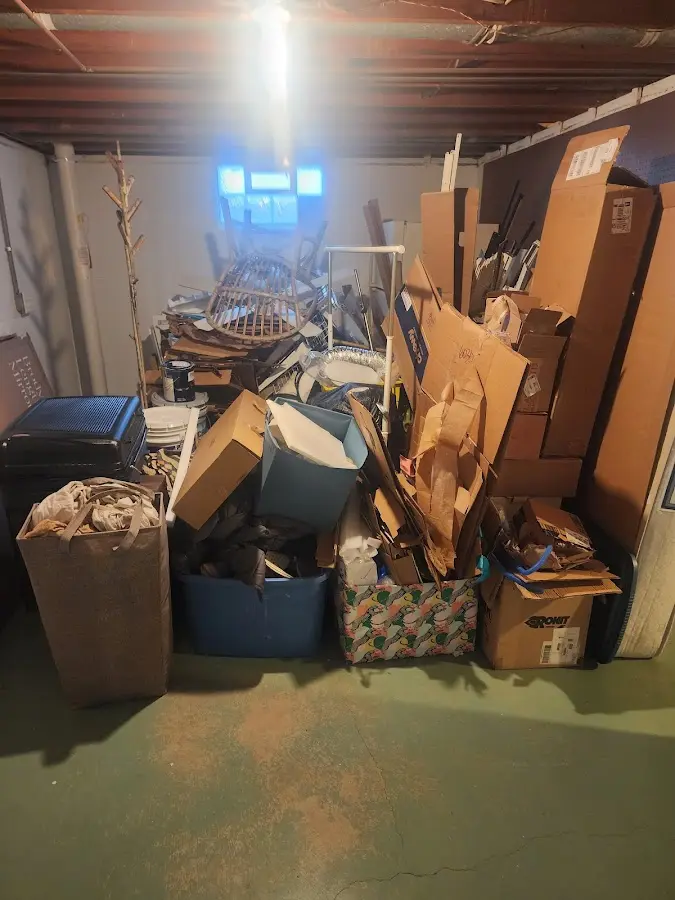 Roll-off dumpster container at job site for 2 Yard Dumpster Rental in Lucedale